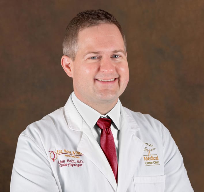 Adam Holdt M.D. of The Hearing Center of MCC